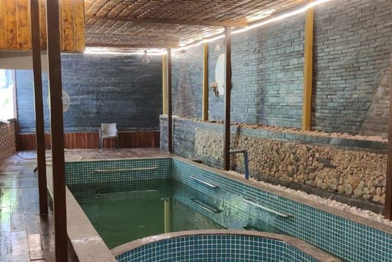 The private stone-clad swimming pool at Palolem Heights